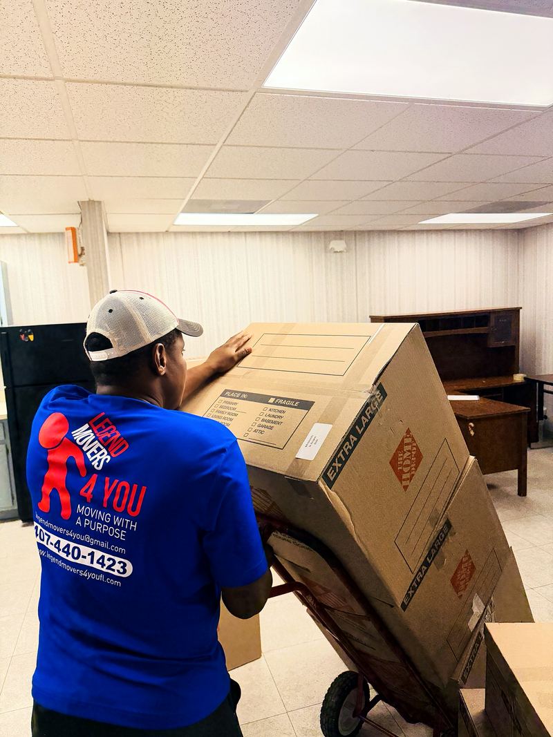 Mover moving office items on a hand truck